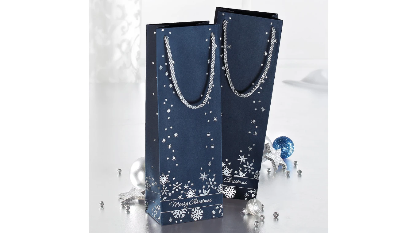 Sacs cadeaux "flocons de neige"avec un relief argenté, pour bouteilles